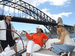 Russell Crowe, Oprah Winfrey and Danielle Spencer sail in Sydney Harbour, Australia.