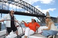 Russell Crowe, Oprah Winfrey and Danielle Spencer sail in Sydney Harbour, Australia.
