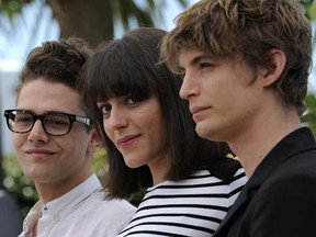 (From L) Canadian actor and director Xavier Dolan, actress Monia Chokri and actor Niels Schneider pose during the photocall of Les Amours Imaginaires at the 63rd Cannes Film Festival on May 15, 2010 in Cannes.     (ANNE-CHRISTINE POUJOULAT/AFP/Getty Images)