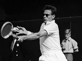 Jaroslav 'Jeff' Drobny of Egypt is seen playing a forehand at the center court during his quarter finals match against Sven Davidson of Sweden, who he beat: 7-5; 6-4; 6-0 on June 29, 1953 - the seventh day of play at the All-England Lawn Tennis Championships at Wimbledon, England, United Kingdom. (AP Photo/Leslie Priest)