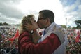 Guatemalan presidential candidate for the Renewed Democratic Liberty party (LIDER), Manuel Baldizon (R), kisses his wife, Rosa Vargas, during the closing of his campaign, at Alameda neighborhood in Guatemala City, on November 4, 2011. Baldizon and retired General Otto Perez Molina are going for a run-off election on November 6 in Guatemala. AFP PHOTO/Johan ORDONEZ (Photo credit should read JOHAN ORDONEZ/AFP/Getty Images)