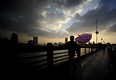 An Egyptian street vendor sells cotton candy on a bridge overlooking the Nile in Cairo on December 28, 2011.      (FILIPPO MONTEFORTE/AFP/Getty Images)