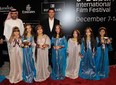 Actor Tom Cruise at the Mission: Impossible - Ghost Protocol premiere at the Dubai International Film Festival, December 7, 2011 in Dubai, United Arab Emirates.  Are those little girls cute, or what? (Gareth Cattermole/Getty Images for DIFF)