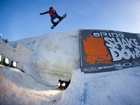 Snowboarder Darrell Mathes at RIDE Shakedown at Mont St. Sauveur.  For use with the article "Buy This/Do That" for Urban Expressions Magazine Spring 2011, edited by Mark Tremblay.  Photo courtesy of Dizzle Entertainment.