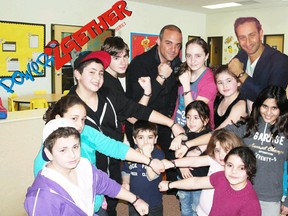 Power2Gether founder Dan Malka (top centre) and Jeff Kovac (top right) with kids wearing anti-bullying wristbands (All photos courtesy Power2Gether)