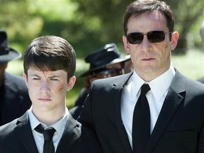 Here's the premise for Awake: Detective Michael Britten (Jason Isaacs, Brotherhood) wakes up from a car accident to learn that his wife, Hannah (Laura Allen, Mona Lisa Smile) died in the crash. But when he wakes again, his wife is alive, but his son, Rex (Dylan Minnette, Saving Grace) died in the accident. Photograph by: Handout , Shaw Media