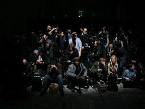 Photographers wait prior to the start of US designer Rick Owens' Fall/Winter 2012-2013 ready-to-wear collection show, on March 1, 2012 in Paris. (FRANCOIS GUILLOT/AFP/Getty Images)