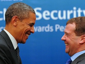 US President Barack Obama and Russian President Dmitriy Medvedev (L) share a smile after their bilateral meeting in Seoul on March 26, 2012 on the sidelines of the 2012 Seoul Nuclear Security Summit. Obama and dozens of other world leaders were to begin the 2012 Seoul Nuclear Security Summit on March 26 curbing the threat of nuclear terrorism, but North Korea's atomic plans will be in focus on the sidelines. AFP PHOTO / Jewel Samad (Photo credit should read JEWEL SAMAD/AFP/Getty Images)