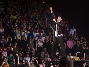 Canadian rock band Hedley (vocalist Jacob Hoggard is pictured here) perform March 12 at the Bell Centre in Montreal. Photo by Dario Ayala/ The Gazette