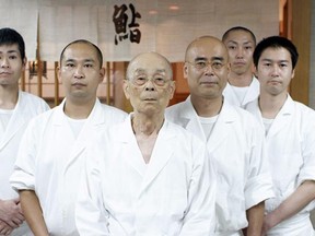 Sushi chef Jiro Ono (centre) and his team. Courtesy Magnolia Pictures.