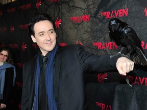 Actor John Cusack at the Los Angeles premiere of Relativity Media's The Raven held at the Los Angeles Theatre on April 23, 2012 in Los Angeles, California.  (Frazer Harrison/Getty Images For Relativity Media)