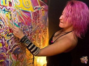 EP1C live painting a rave in Montreal. (Photo by CoCo-Eve Photography)