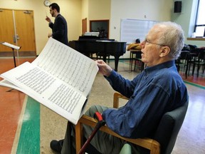 MONTREAL, QUEBEC; APRIL 19,  2011 -- Vanier College music teacher Robert Jones (right) follows along as choir director Philippe Bourque directs the Vanier Choir in rehearsal of La Terra Promessa at Vanier College in Montreal April 19, 2011.   Jones composed the choral piece while on his current medical leave for treatment for renal cell carcinoma.                  (John Mahoney/THE GAZETTE)