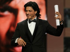 Indian actor Shah Rukh Khan performs after receiving a special prize award for his career during the opening ceremony of the Marrakech 11th International Film Festival in Marrakech on December 2, 2011. AFP PHOTO / VALERY HACHE (Photo credit should read VALERY HACHE/AFP/Getty Images)