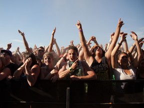 Photo of fans at Vans Warped Tour taken July 16, 2011 at Parc Jean-Drapeau by Michelle Berg/ The Gazette