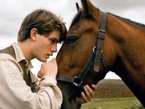 Jeremy Irvine and the horse we're supposed to care about in War Horse.