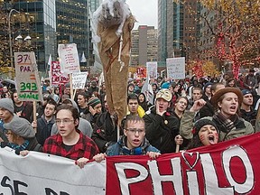 MONTREAL, QUE: NOVEMBER 10, 2011 - CEGEP and university students marched from Berri St to Premier Jean Charest's office at McGill College Ave in Montreal, on Thursday, November 10, 2011 to protest tuition hikes.  (Dave Sidaway / THE GAZETTE)