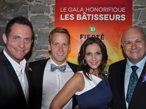 Quebec TV personality jasmin Roy, former Montreal Impact soccer player David Testo, Carmie Saputo (who presented the award to David Testo), and Montreal Pride president Eric Pineault, at the Montreal Pride all-star gala to mark International Day Against Homophobia on May 17, at the swanky Hotel Nelligan in Old Montreal (All photos by André Bilodeau, courtesy Montreal Pride).