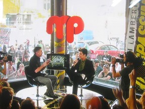Screaming fans swooned over Adam Lambert when he made a live television appearance at MusiquePlus' downtown Montreal studio on May 30, 2012. (All photos by Richard Burnett)