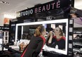 Makeup artist Melanie Belisle touches up her look at the new downtown Sephora, two days before opening. PHOTOS: Vincenzo D'Alto / THE GAZETTE