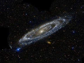 This image obtained from NASA and the Jet Propulsion Laboratory shows the Andromeda Galaxy. Roeland van der Marel, of the Space Telescope Science Institute in Baltimore, announced on May 31, 2012 that Andromeda and the Milky Way Galaxy are on a collision course and will crash head-on in four billion years. The theory of the collision has long been known, but van der Marel  and his collegues have confirmed it. Using the Hubble telescope astromers were able to measure Andromeda's sideway motion, a key component of the galaxy's path through space, and which no one had been able to determine. "The Andromeda Galaxy is heading straight in our direction," van der Marel said. The galaxies are moving toward one another at a speed of about 250,000 mph (400,000 kilometers per hour).   "AFP PHOTO / NASA/Jet Propulsion Laboratory"