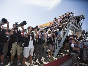 MONTREAL, QUE.: JUNE 10, 2012-- Photographers line up to shoot the finishing ceremony at the end of the Formula One Canadian Grand Prix at the Circuit Gilles Villeneuve in Montreal on Sunday, June 10, 2012. (Dario Ayala/THE GAZETTE)