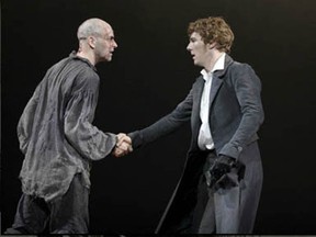 Frankenstein (right) played by Benedict Cumberbatch, gives his word to his Creature, played by Jonny Lee Miller, in the filmed play Frankenstein, which was directed by Danny Boyle. Photo by Catherine Ashmore, from the web site of the National Theatre.