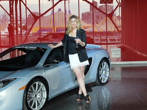 My annual "lean on a car" pose at the Hugo Boss party at the Montreal science Center (photo by Philip Awadalla)