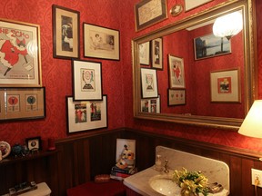 MONTREAL, QUE.: APRIL 12, 2012 -- A bathroom near the front entrance in the home of Karen Etingin at home in the Westmount area of Montreal  Thursday, April 12, 2012. Etingin has a vintage poster gallery in Montreal and has long been a collector of vintage posters, which decorate several walls/rooms in her cozy Victorian home.  (John Kenney/THE GAZETTE)