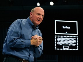 Microsoft CEO Steve Ballmer shows the new tablet called Surface during a news conference at Milk Studios on June 18, 2012 in Los Angeles, California. The new Surface tablet has a 10.6 inch screen complete with cover that contains a full multitouch keyboard. (Photo by Kevork Djansezian/Getty Images)