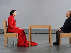 Artist Marina Abramovic (L) performs during the Marina Abramovic: The Artist is Present exhibition opening night party at The Museum of Modern Art on March 9, 2010 in New York City.  (Andrew H. Walker/Getty Images)