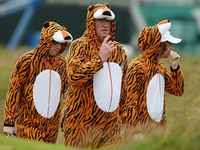 Tiger Woods fans follow the play during the second practice round before the start of the 141st Open Championship at Royal Lytham & St Annes on July 17, 2012 in Lytham St. Annes, England.  (Ross Kinnaird/Getty Images)