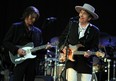 US legend Bob Dylan (R) performs on stage during the 21st edition of the Vieilles Charrues music festival on July 22, 2012 in Carhaix-Plouguer, western France.  AFP PHOTO / FRED TANNEAUFRED TANNEAU/AFP/GettyImages