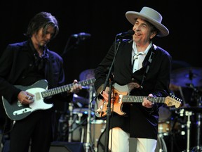 US legend Bob Dylan (R) performs on stage during the 21st edition of the Vieilles Charrues music festival on July 22, 2012 in Carhaix-Plouguer, western France.  AFP PHOTO / FRED TANNEAUFRED TANNEAU/AFP/GettyImages