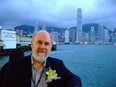 David Bordwell with Hong Kong harbour behind him. Photo is from his web site, davidbordwell.net