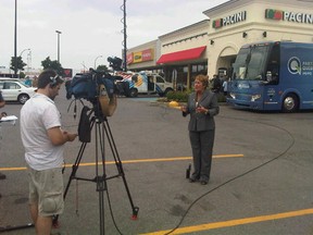 Parti Quebecois leader Pauline Marois in a Trois-Rivieres parking lot for a campaign TV interview.