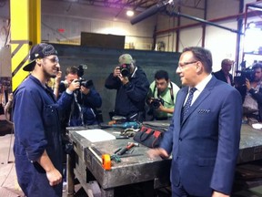 Coalition Avenir Québec leader François Legault toured the Acier Marquis steel parts plant in St. Celestin, Quebec on Friday, Aug. 10, 2012.