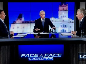 Francois Legault and Jean Charest had a lot to say about a lot of things Tuesday night, but little about the non-francophone votes they're supposedly fighting to win. 2012. Video still from LCN (Pierre Obendrauf / THE GAZETTE)