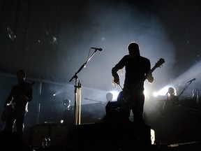 Members of the Icelandic post-rock band Sigur Ros are silhouetted during their performance during the first day of the Osheaga Music and Arts Festival at Jean Drapeau Park   (THE GAZETTE / Tijana Martin)