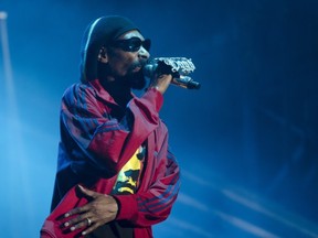 Snoop Dogg performs during the second day of the Osheaga Music and Arts Festival at Jean Drapeau Park in Montreal on Saturday, August 4, 2012.  (THE GAZETTE / Tijana Martin)