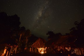 Night view of Irotatheri community, in Amazonas state, southern Venezuela, 19 km away from the border with Brazil, on September 7, 2012. The Venezuelan government on Friday agreed to lead a delegation of national and international media to Irotatheri after a slaughter of 80 Yanomami natives was reported. Venezuelan militarymen detected evidence of illegal mining in the south of the country, where Yanomami natives would have presumably been massacred by Brazilian illegal gold prospectors.  AFP PHOTO/Leo RAMIREZLEO RAMIREZ/AFP/GettyImages