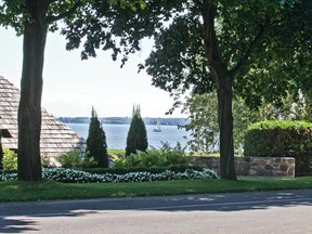 MONTREAL, QUE.: SEPTEMBER 1, 2012 -- The view of Lac St-Louis between houses on Lakeshore Rd in Beaconsfield, west of Montreal, Saturday September 1, 2012.  Beaconsfield is proposing a zoning change to preserve "visual access" to the lake.                    (John Mahoney/THE GAZETTE)