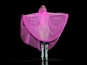 U.S singer Lady Gaga opens the Philip Treacy Spring/Summer 2013 collection during London Fashion Week, Sunday, Sept. 16, 2012. (AP Photo/Jonathan Short)
