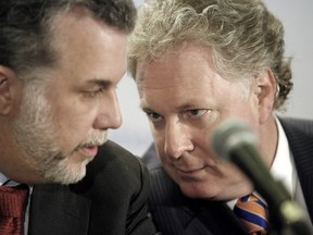If Philippe Couillard (left) runs for and wins the leadership of the Quebec Liberals, will the party's indifference to anglos during Jean Charest's watch endure? (THE GAZETTE/Dave Sidaway)