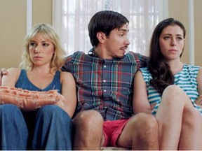 Jesse (Justin Long, centre,) tries to convince Katie (Ari Graynor, left) to accept Lauren (Lauren Anne Miller, right) as her new roommate, in the comedy For A Good Time Call . . . Photo: Focus Features