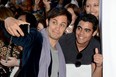 Actor Gael Garcia Bernal snaps a picture with a fan at the The Impossible premiere at the 2012 Toronto International Film Festival on September 9, 2012 in Toronto, Canada.  (Jason Merritt/Getty Images)