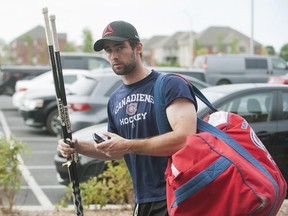 Montreal Canadiens' player Louis Leblanc arrives for an informal training session at the Canadiens' training facility in Brossard, Que., Monday, September 17, 2012 on day two of the NHL lockout. THE CANADIAN PRESS/Graham Hughes