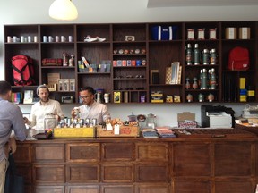 Owner Matt Savoie (centre) mans the front counter (photo by Eve Thomas)