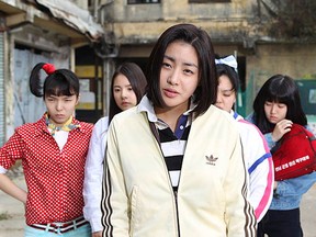 Fight me, fight my gang! A scene from the South Korean comedy-drama Sunny.  Actress Kang So-ra, in foreground, plays the character Chun-wa in her high school days. (Photo: CJ Entertainment)