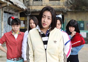 Fight me, fight my gang! A scene from the South Korean comedy-drama Sunny.  Actress Kang So-ra, in foreground, plays the character Chun-wa in her high school days. (Photo: CJ Entertainment)